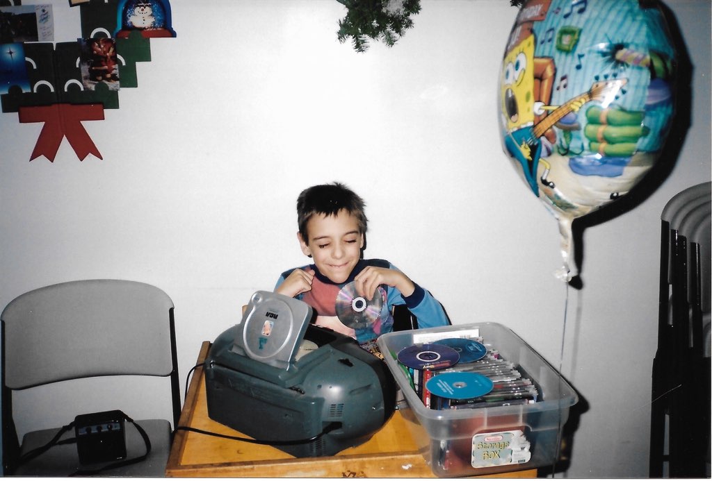 Bob as a little one changing CDs