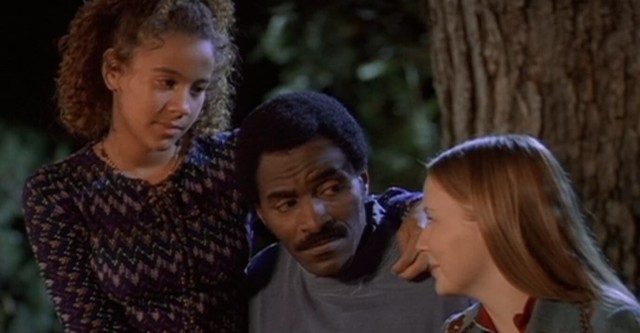 Piper and Ron Dellums talking with Mahree Bok