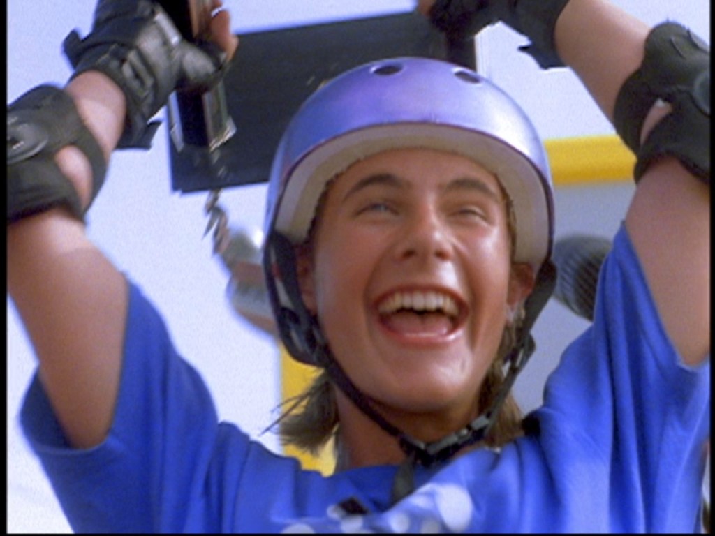 Brink holding up his trophy