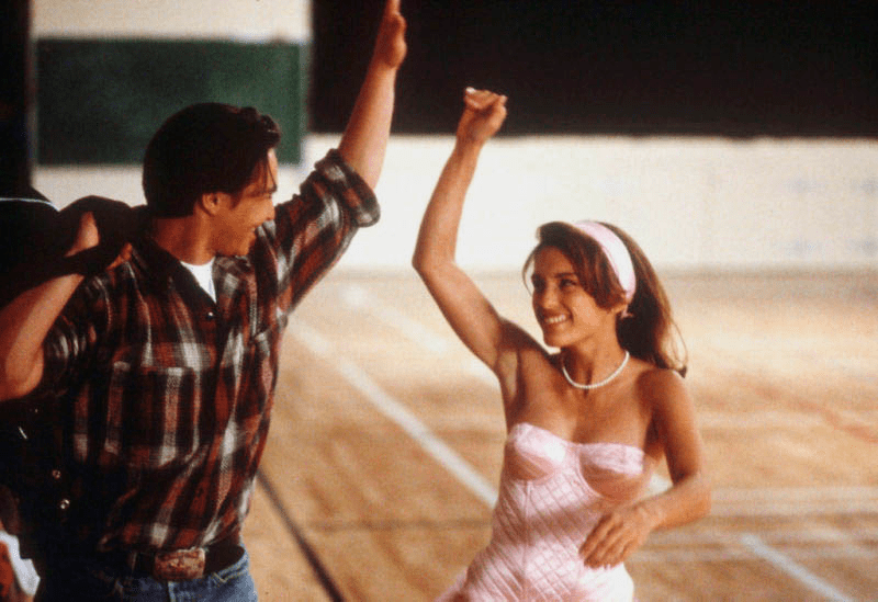 adorable photo of Zach and Susie Q high-fiving